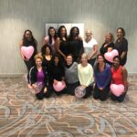 Group celebration at a N.E.W. Body gathering