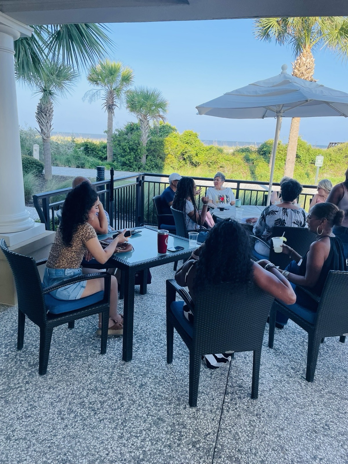 Poolside gathering under the palms