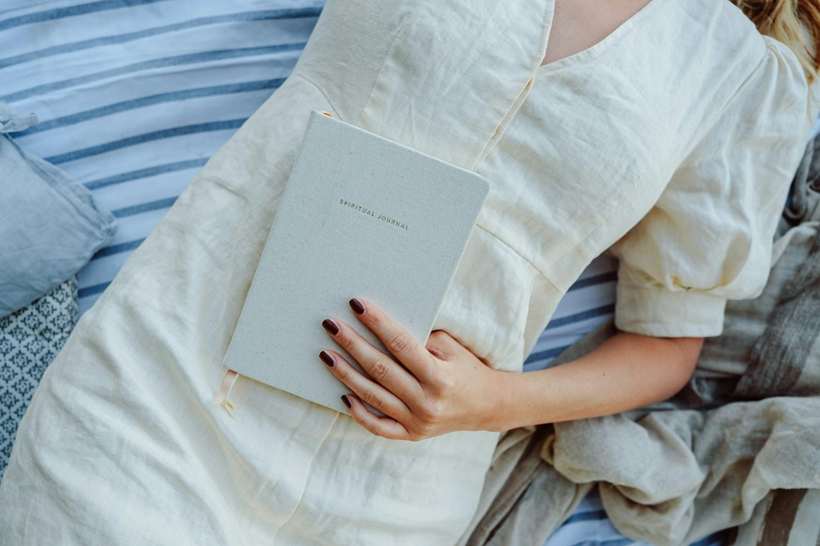 A quiet moment of reflection with a wellness journal